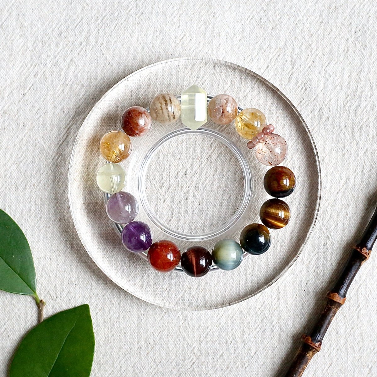 Tiger’s eye and black gold super seven bracelet for power, protection, and spiritual balance.