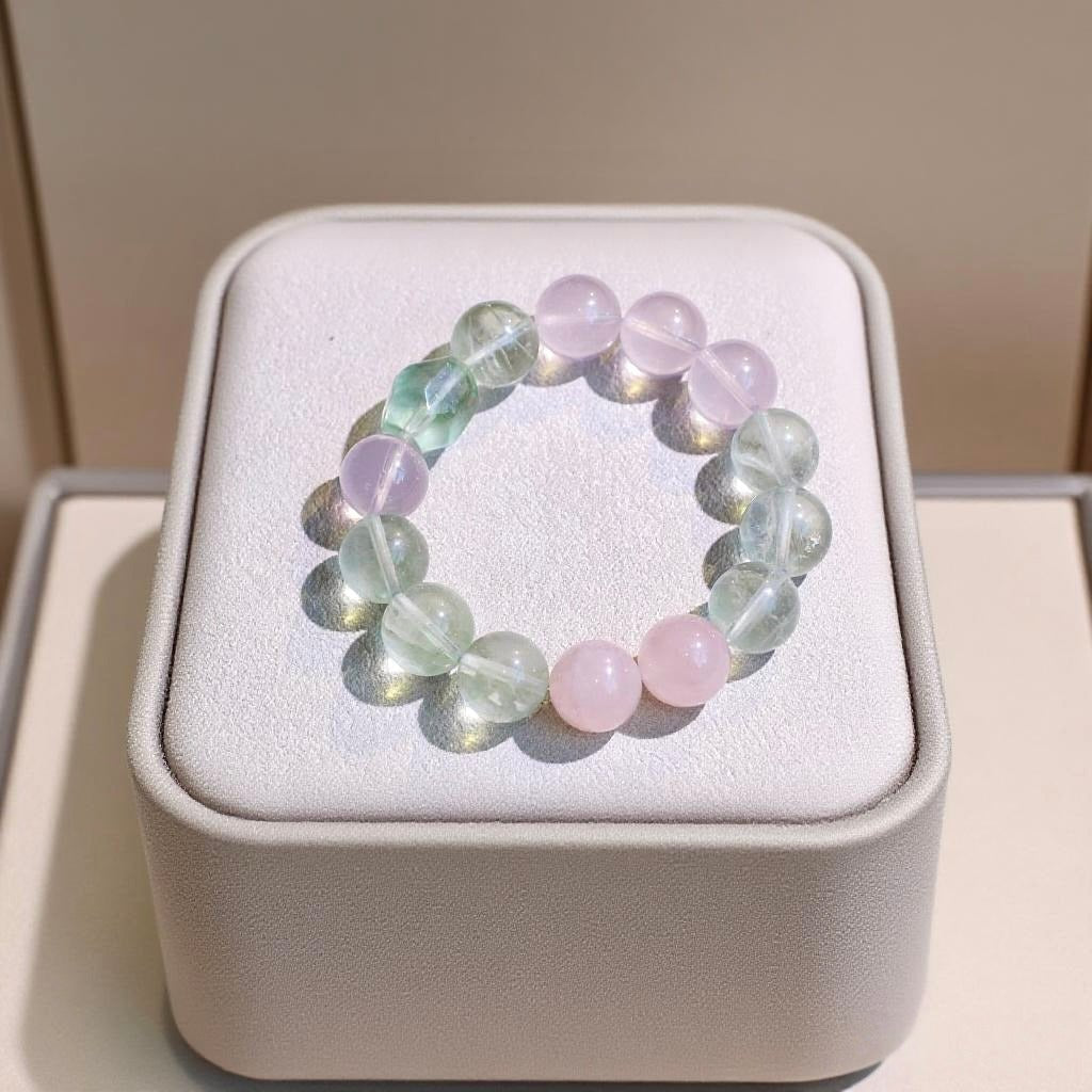 Green fluorite and rose quartz bracelet for heart healing and emotional calm.