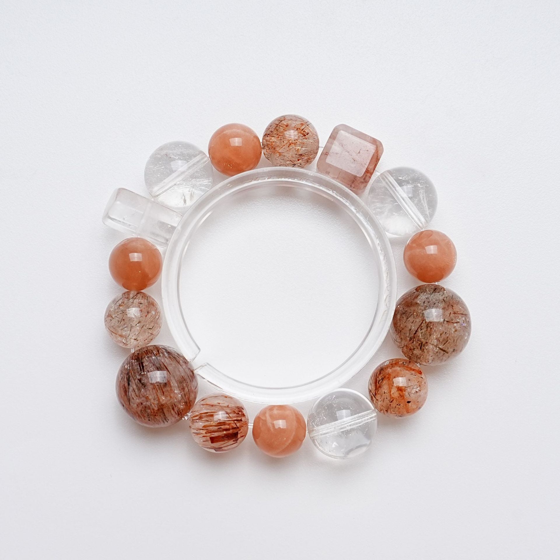 Black Gold Super Seven, White Crystal & Orange Moonlight Bracelet — Power and Balance