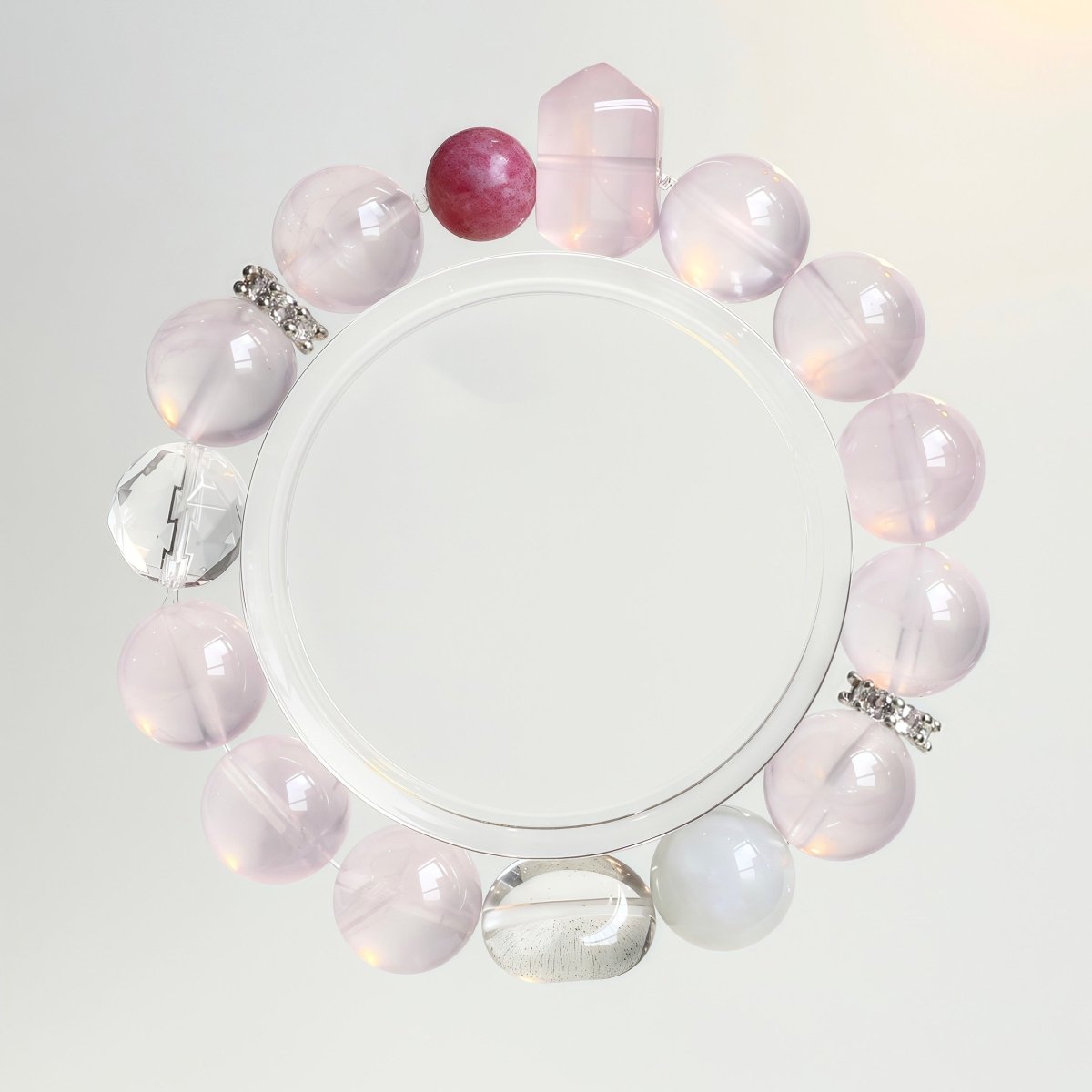 Rose quartz and rhodonite bracelet for love, self-care, and heart healing.