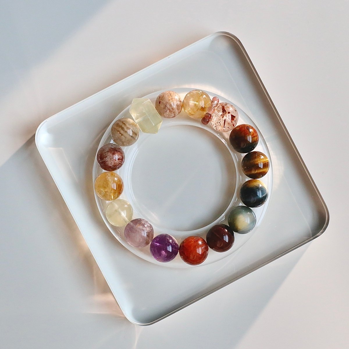 Tiger’s eye and black gold super seven bracelet for power, protection, and spiritual balance.