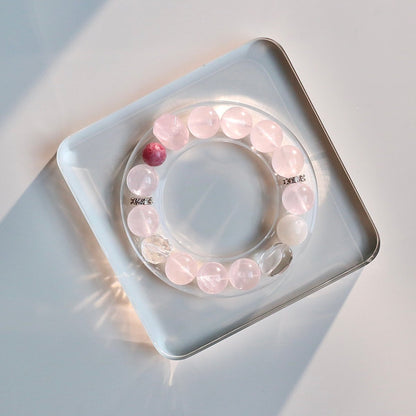 Rose quartz and rhodonite bracelet for love, self-care, and heart healing.