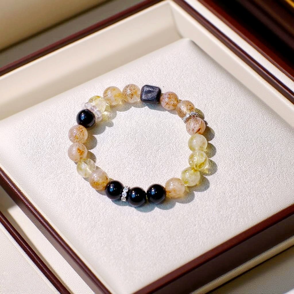 Black Super Seven, Black Obsidian, Yellow Aragonite, and Golden Aventurine bracelet for confidence and warmth
