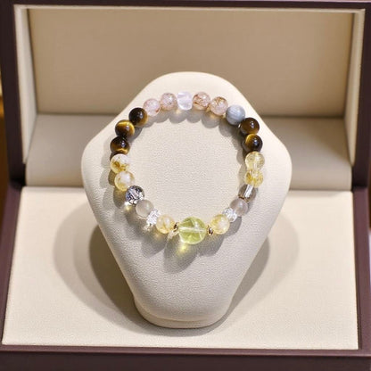 Natural yellow tiger’s eye and lemon quartz bracelet with mixed crystals for confidence and abundance.