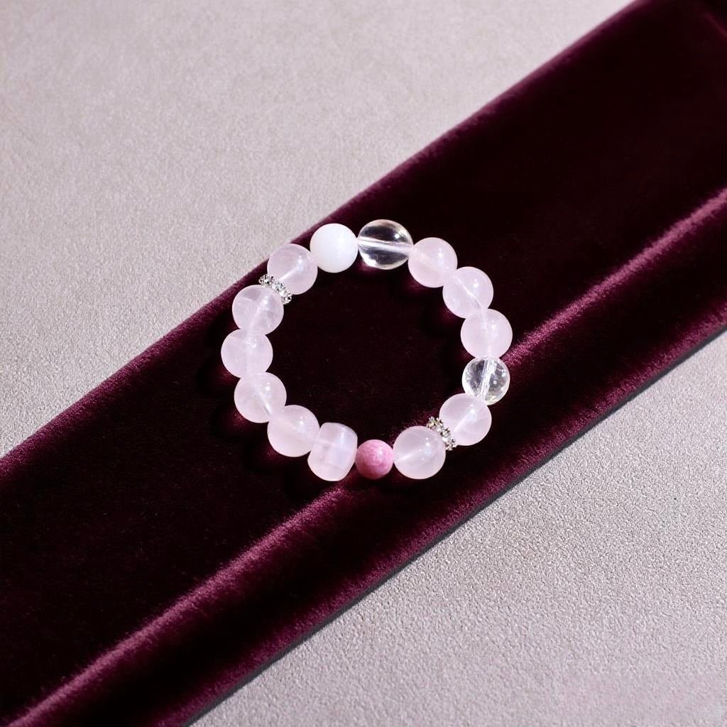Rose quartz and rhodonite bracelet for love, self-care, and heart healing.