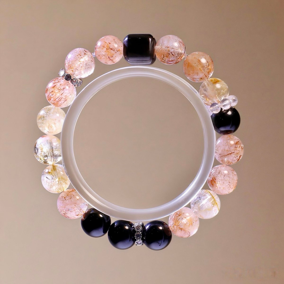 Black Super Seven, Black Obsidian, Yellow Aragonite, and Golden Aventurine bracelet for confidence and warmth