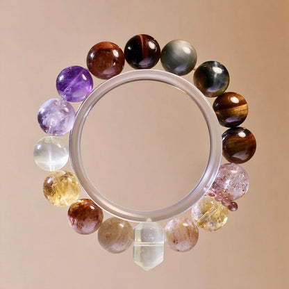 Tiger’s eye and black gold super seven bracelet for power, protection, and spiritual balance.